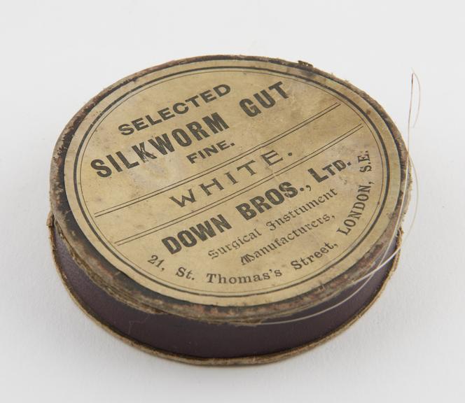 Circular cardboard container of silkworm gut