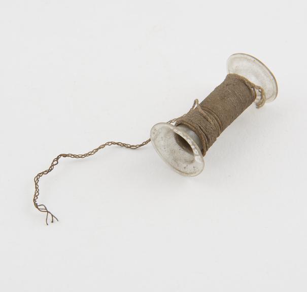 Ligature on glass bobbin, 1871-1950