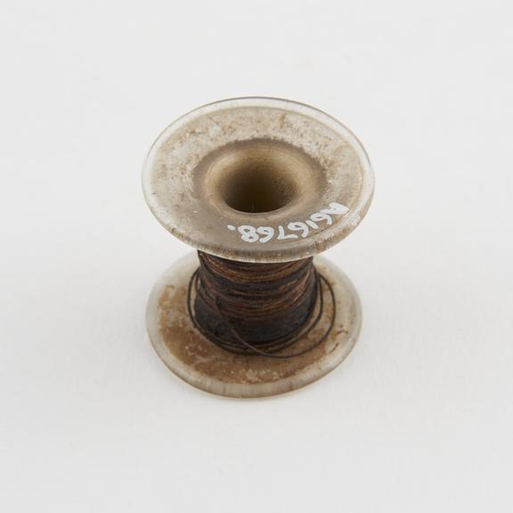 Ligature on glass bobbin