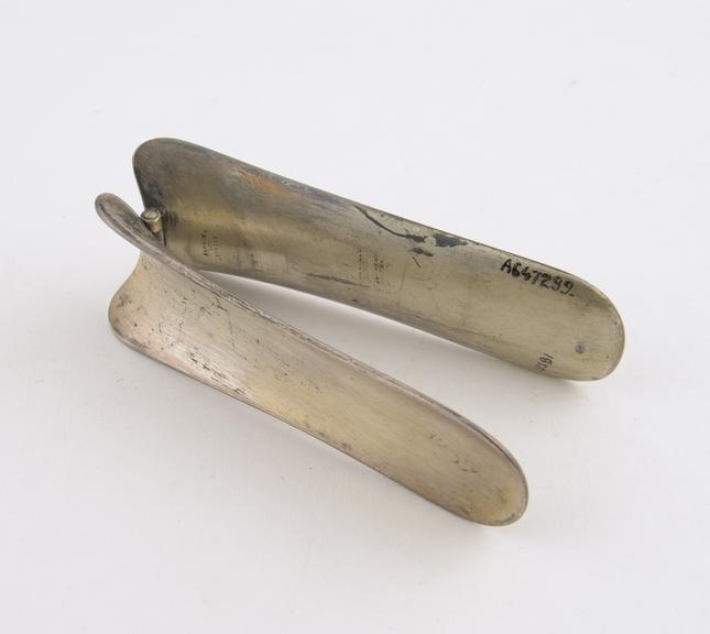 Folding tongue depressor, plated metal, made by Fannin and Co