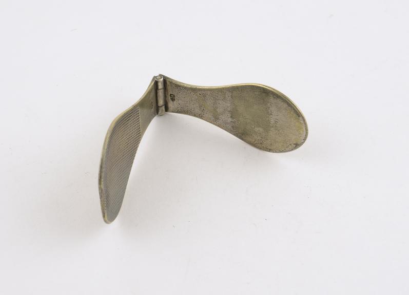 Folding tongue depressor, plated metal, by Matthews, London