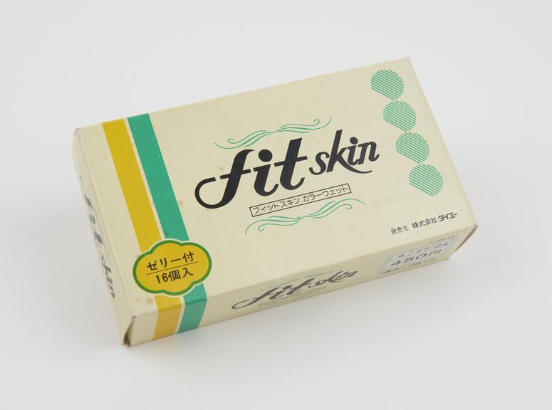 Green and yellow carton of fit skin' condoms, Japanese, 1970s.'