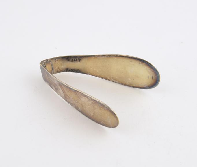 Tongue depressor, hinged silver(?), owned by Sir Henry Morris