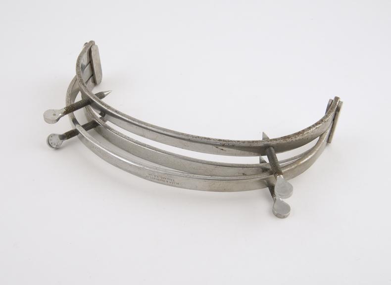 Lund's folding cranium holder, made by Allen and Hanburys Ltd