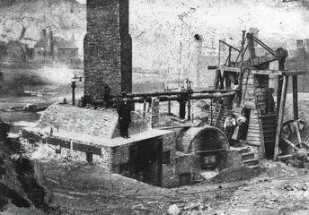 Two photo prints of a Newcomen Colliery Winding Engine made and used at Coalbrookdale about 1790