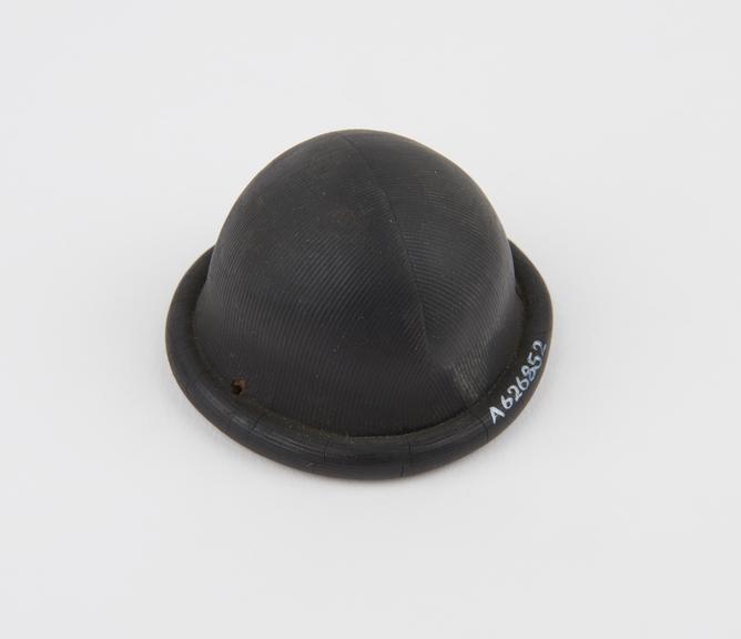 Rubber cervical cap as used and fitted by Jewish midwives