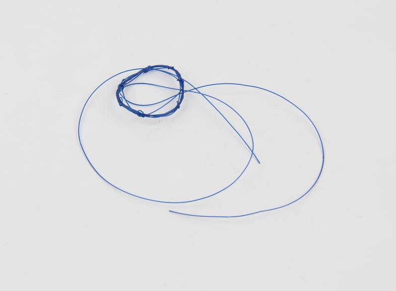 Nylon intra-uterine device, consisting of loops of nylon thread