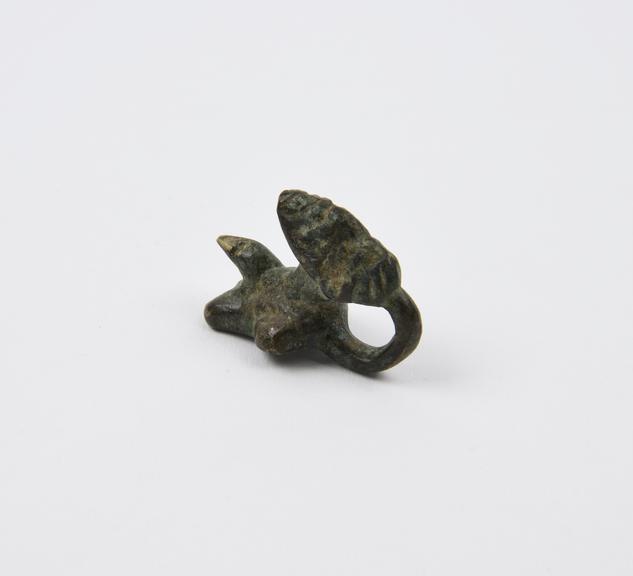 Phallic amulet, bronze, bearded head at top, Mediterranean(?)