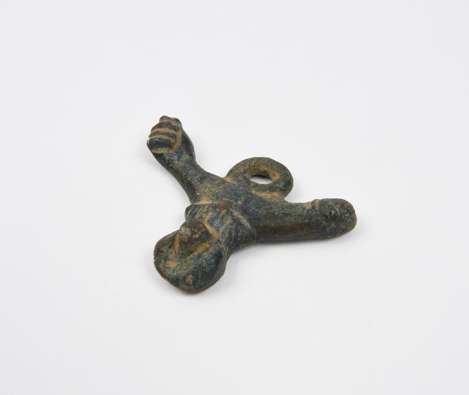 Bronze amulet which incorporates an erect penis