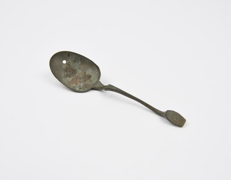 Metal spoon, oval bowl with slightly curved stem