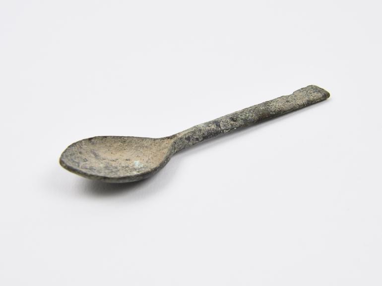 Metal spoon, leaf shaped bowl, with flat stem