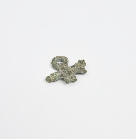 Small amuletic bronze amulet in form of phallic cross