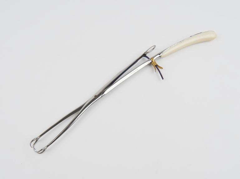 Uterine forceps, steel, vulcanite handle, by Collin of Paris