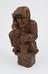 Early 20th century carved wooden figure of witch with cat and