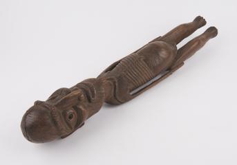 Wooden statue depicting a stylesea emaciated figure