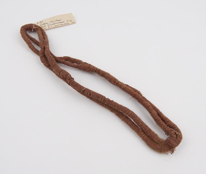 necklet consisting of double band of twisted fibre covered with