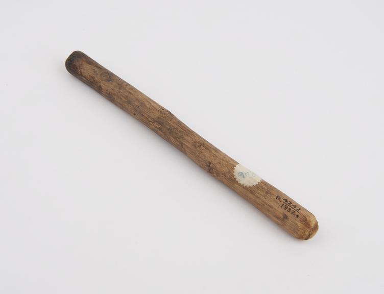 Wooden stick with rounded ends