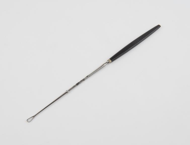 Curette, uterine, steel shaft, ebony handle