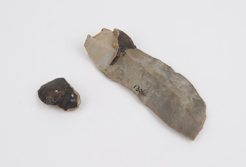 Grey stone knife blade with traces of clay haft, from Australia