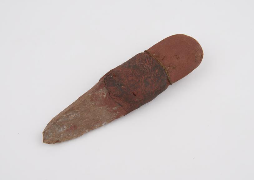 Circumcision knife with flint blade attached to wooden handle