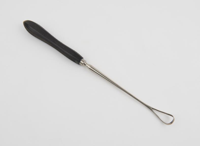 Curette, uterine, steel shaft, ebony handle