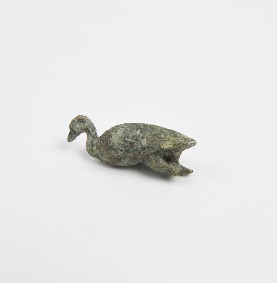 Solid bronze amulet in form of bird