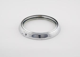 Front fitting for one Lucas sealed beam headlamp