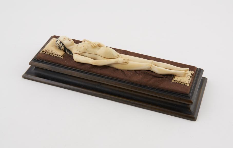 Ivory anatomical figure, a pregnant female