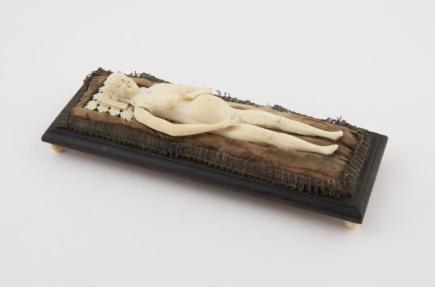 Ivory anatomical figure, a pregnant female