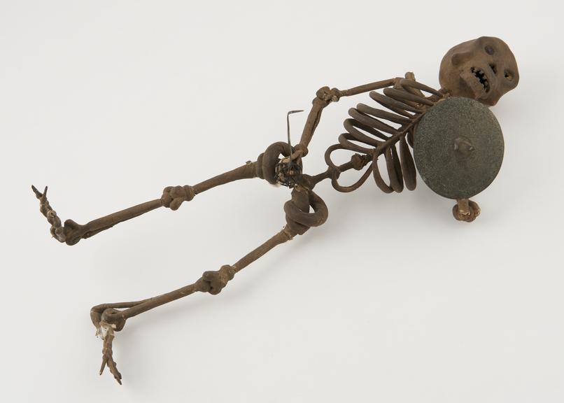 Plaster and metal skeleton representing death, English