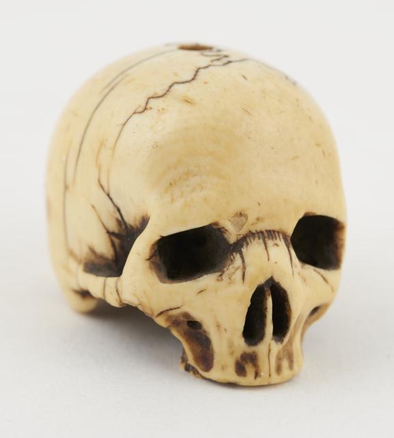 Ivory model of a skull, fairly crudely carved