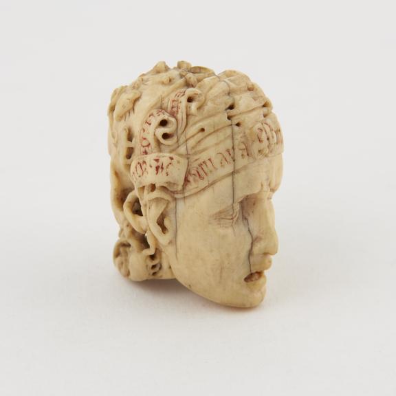 Ivory model of a head divided into two halves