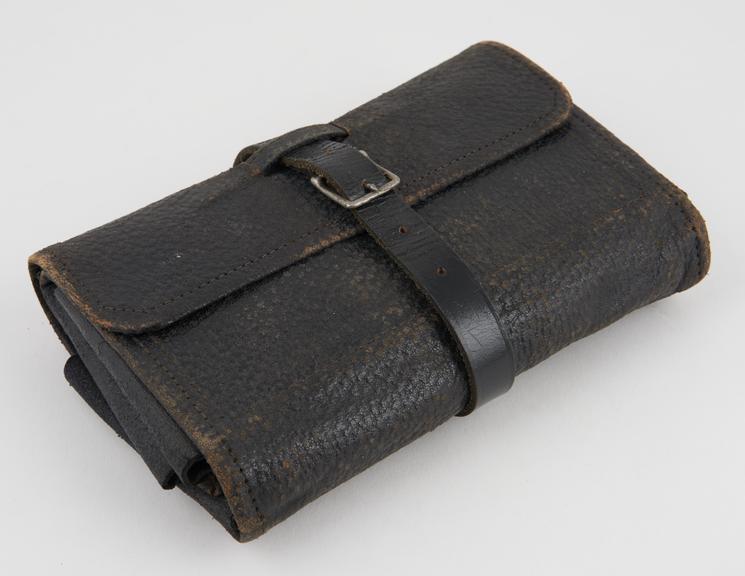 Leather instrument roll, empty, maker unknown, 1920-1950