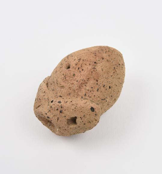 Votive offering, possibly a heart, terracotta, probably Roman