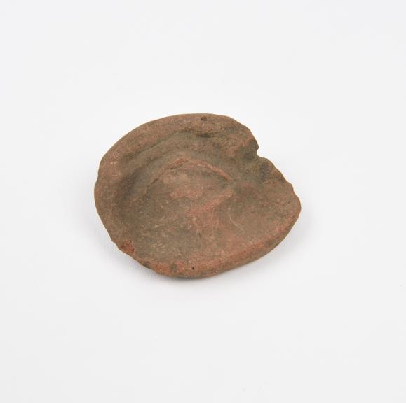 Votive eye and surround, terracotta, probably Roman, 200BC-200AD