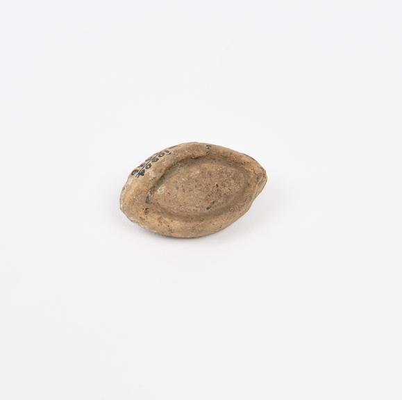 Votive eye, terracotta, probably Roman, 400BC-100AD