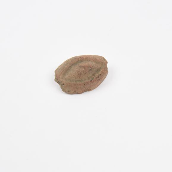 Votive right eye, terracotta, probably Roman, 200BC-200AD