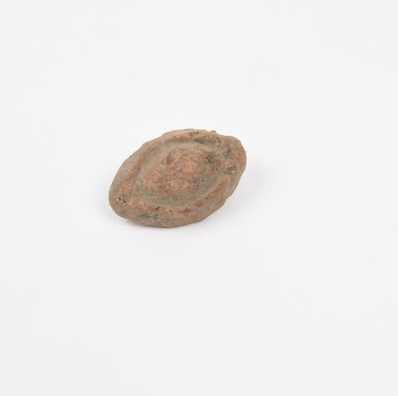 Votive left eye, terracotta, probably Roman, 200BC-200AD