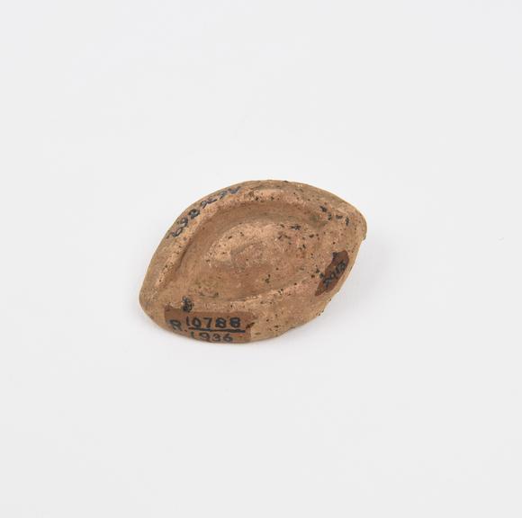 Votive eye, terracotta, probably Roman, 200BC-200AD