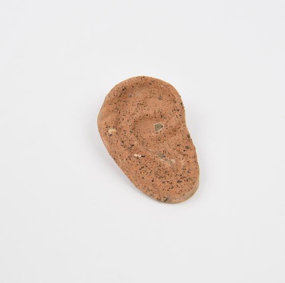 Votive right ear, terracotta, probably Roman, 200BC-200AD