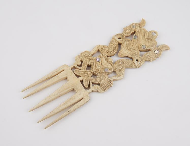 Whalebone comb, elaborately carved handles, Maori, New Zealand