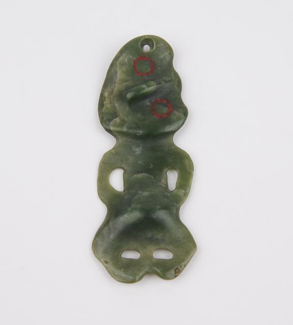 Green jade tiki, head tilted to right, untraditional design