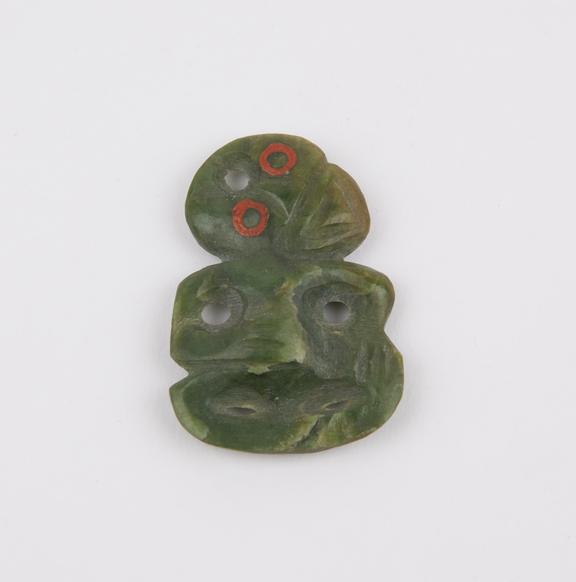 Green jade tiki, with eyes filled with sealing wax, Maori