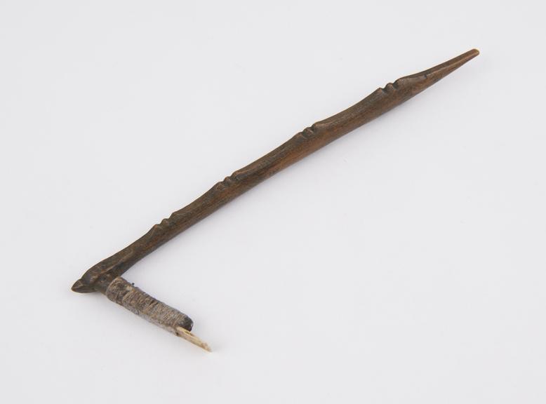 Bone blade lashed to carved wooden handle, Maori, New Zealand