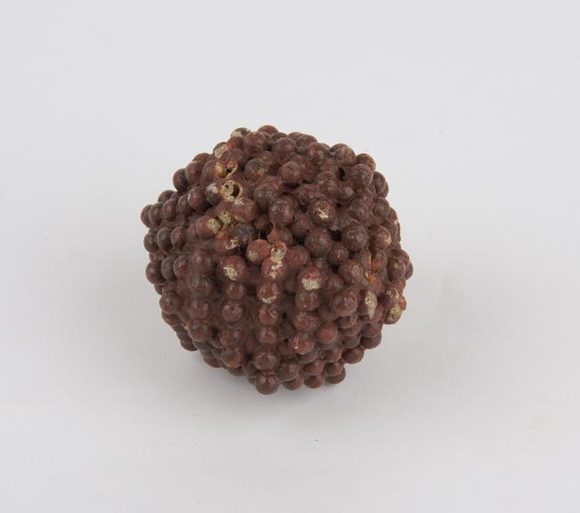 Balls packed to form an icosahedron to represent chrystal