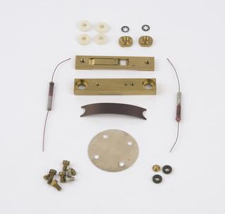 Parts of holder for a GT-cut quartz crystal plate
