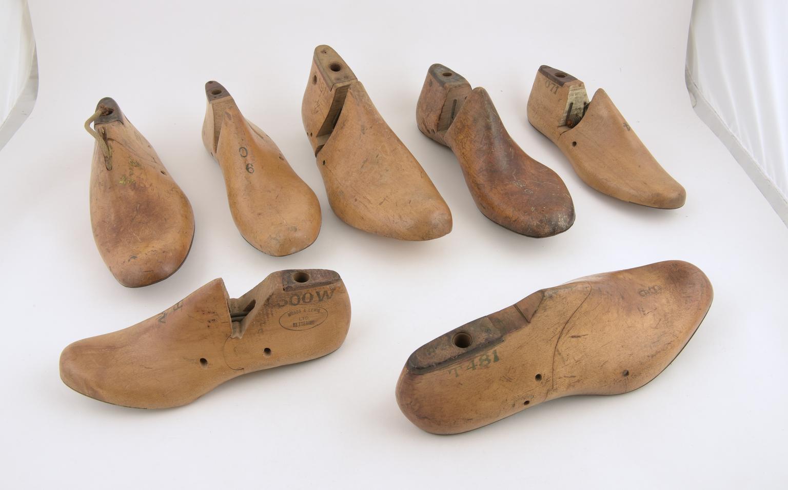 Seven wooden shoe lasts