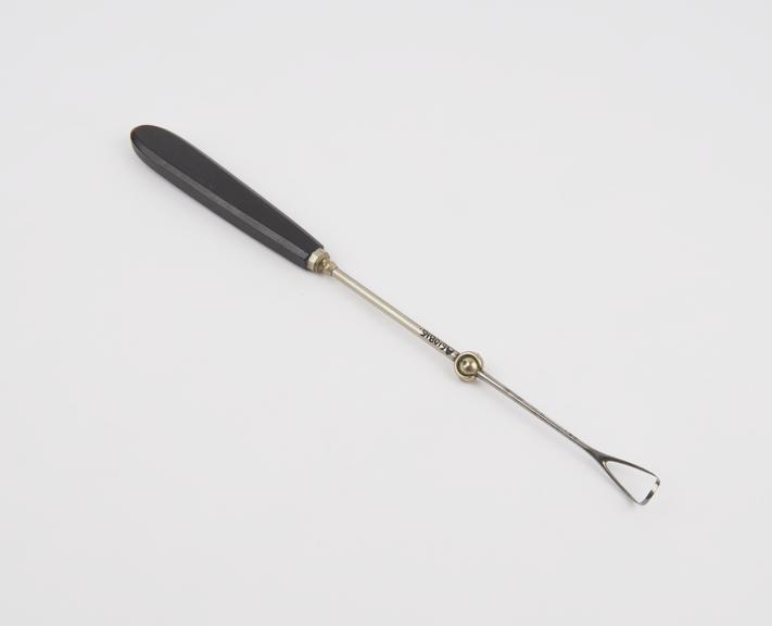 Curette, uterine, steel shaft, ebony handle