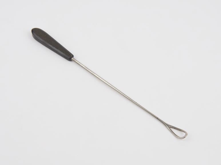 Curette, uterine, steel shaft, ebony handle