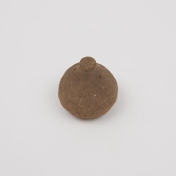 Votive stylized breast, terracotta, probably Roman, 200BC-200AD